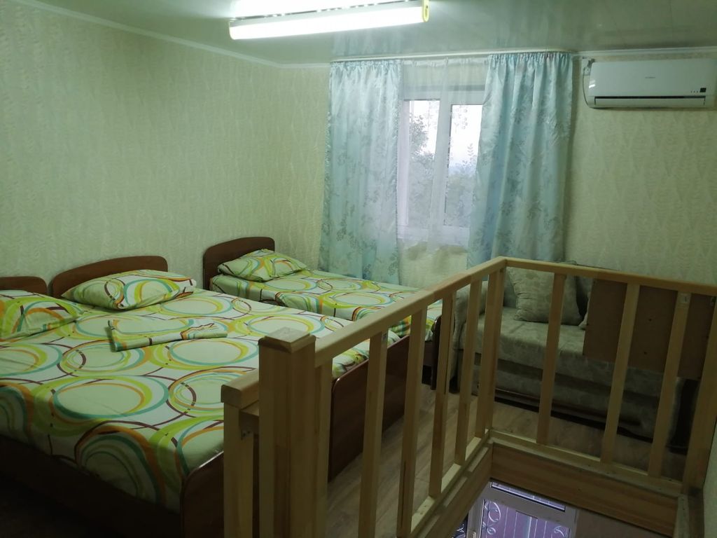 Четырёхместный номер двухуровневый с удобствами