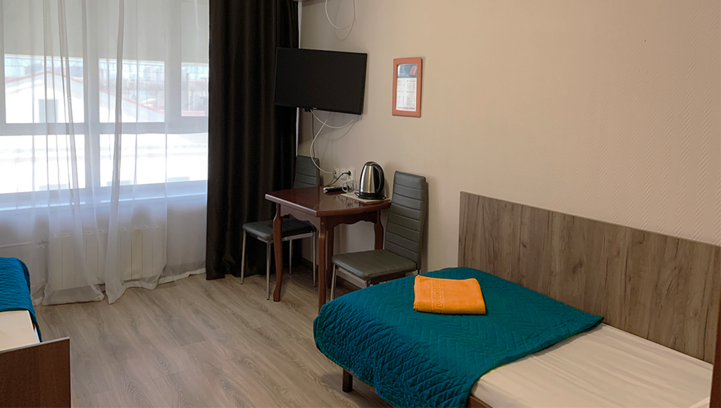 Двухместный номер с 2 отдельными кроватями стандарт