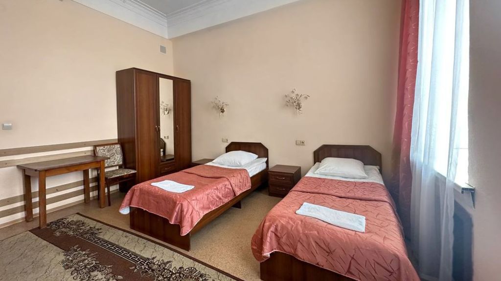 Двухместный номер с 2 отдельными кроватями эконом