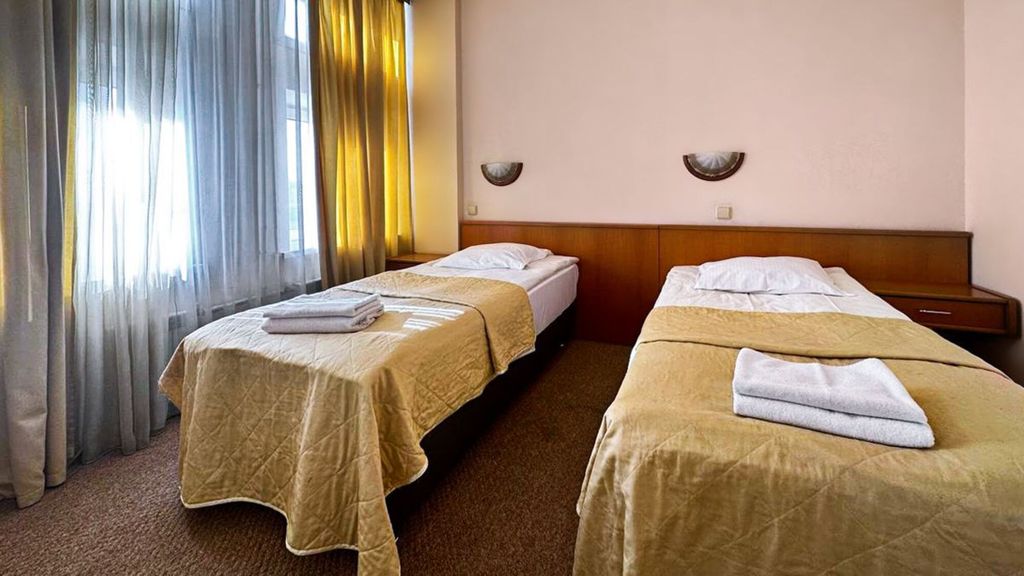Двухместный номер с 2 отдельными кроватями комфорт двухкомнатный
