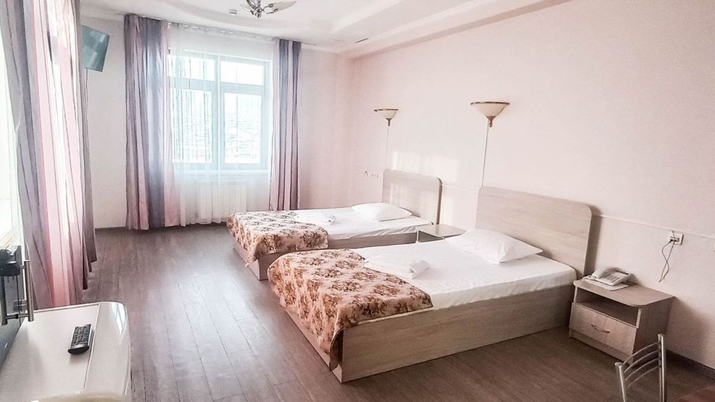 Двухместный номер с 2 отдельными кроватями стандарт