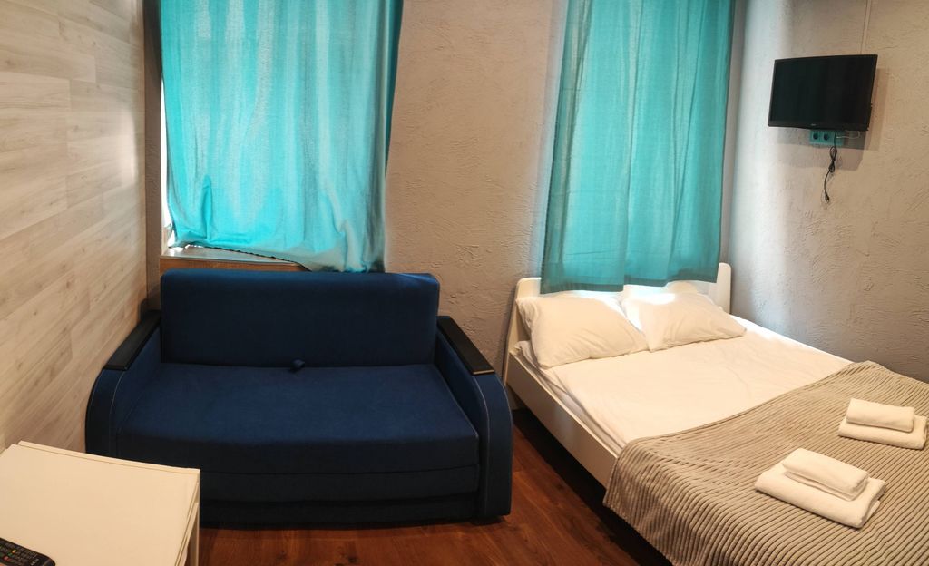 Четырёхместный номер Четырехместный с диваном