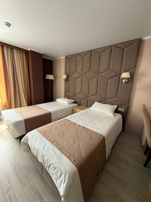 Двухместный номер с 2 отдельными кроватями стандарт