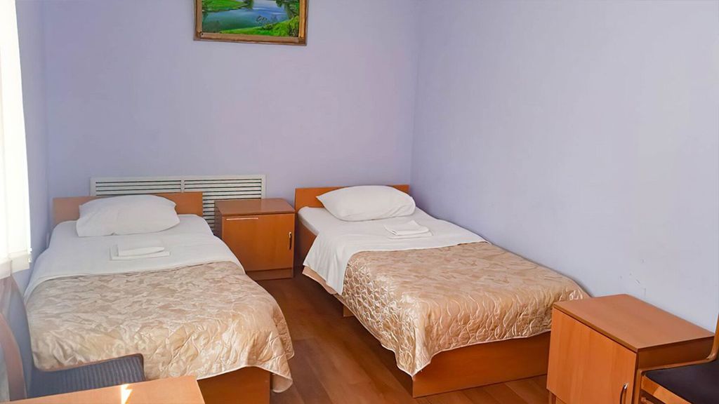 Двухместный номер с 2 отдельными кроватями эконом (без с/у)