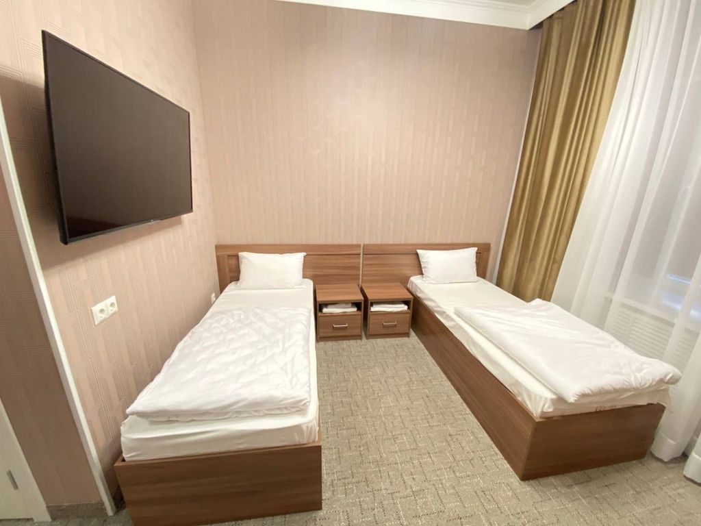 Двухместный номер с 2 отдельными кроватями стандарт