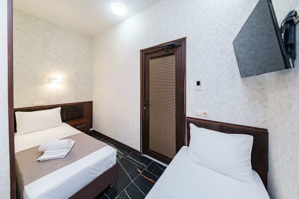 Двухместный номер с 2 отдельными кроватями бюджетный