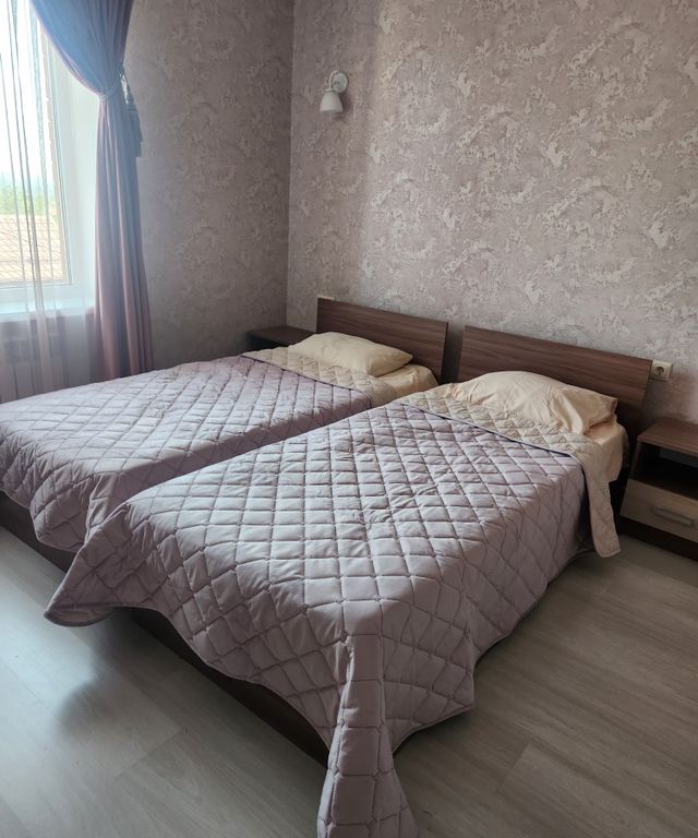 Двухместный номер с 2 отдельными кроватями 3 с с/у на этаже