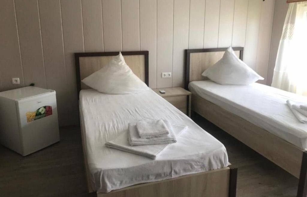 Двухместный номер с 2 отдельными кроватями стандарт