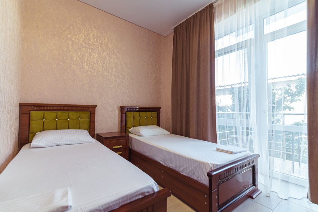 Двухместный номер с 2 отдельными кроватями стандарт