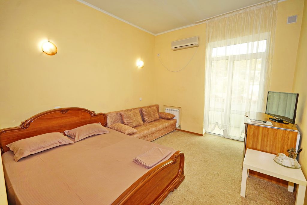 Семейный номер четырёхместный с балконом