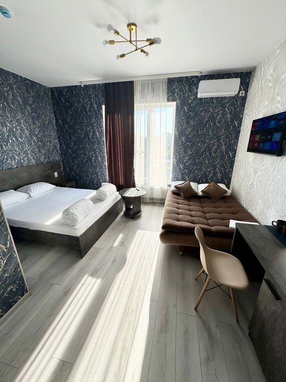 Четырёхместный номер комфорт с диваном