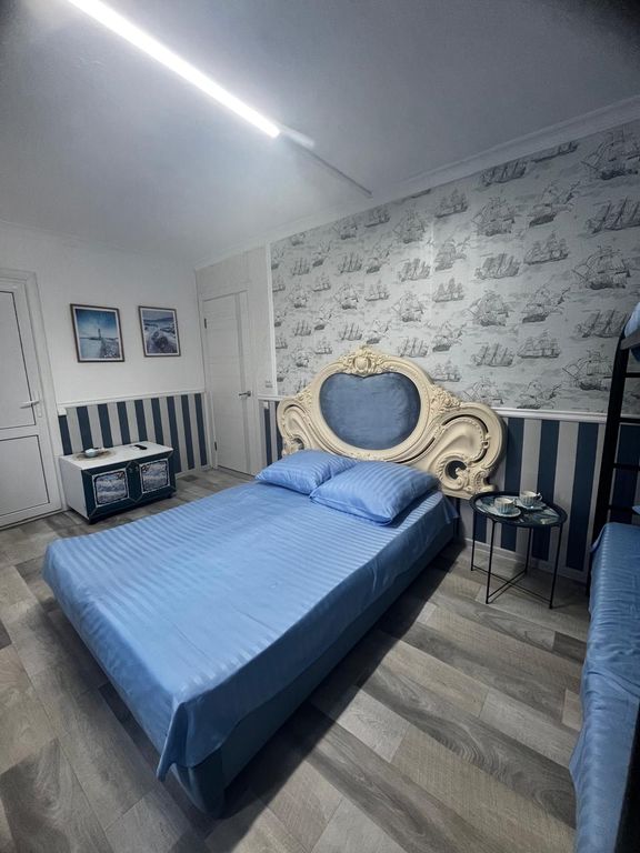 Четырёхместный номер стандарт с балконом