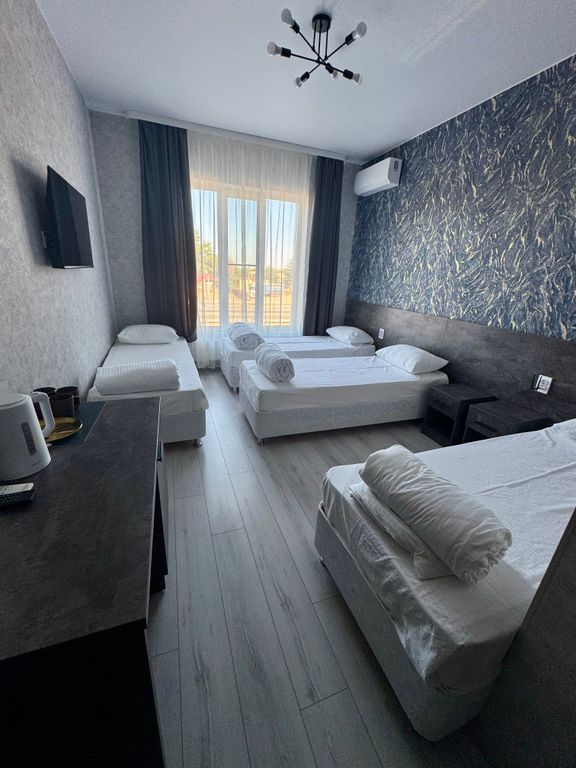 Четырёхместный номер комфорт с раздельными кроватями