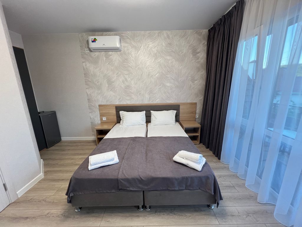 Двухместный номер с 2 отдельными кроватями улучшенный с видом на горы