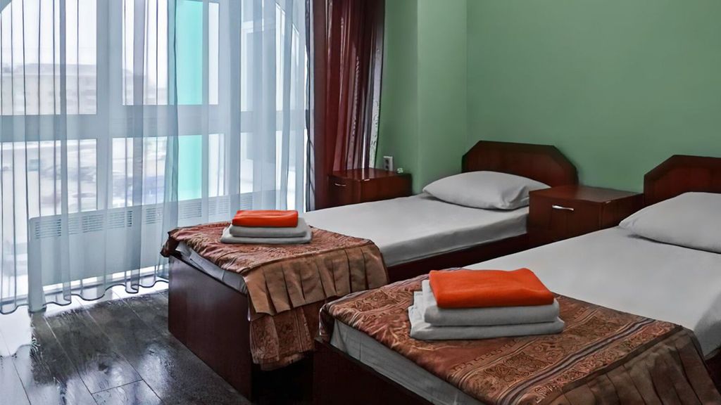 Двухместный номер с 2 отдельными кроватями стандарт