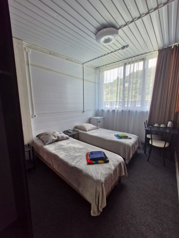 Двухместный номер с 2 отдельными кроватями стандарт