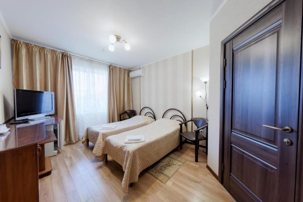 Двухместный номер с 2 отдельными кроватями Стандарт