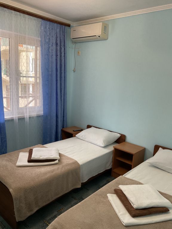 Двухместный номер с 2 отдельными кроватями стандарт