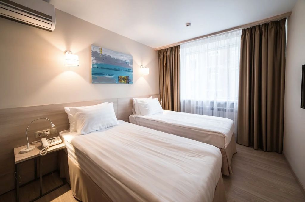 Двухместный номер с 2 отдельными кроватями Стандартный двухместный номер с двумя кроватями