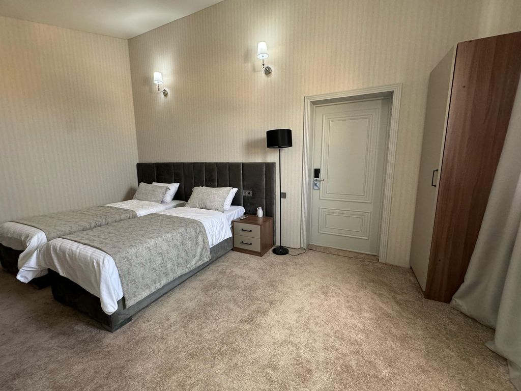 Двухместный номер с 2 отдельными кроватями улучшенный