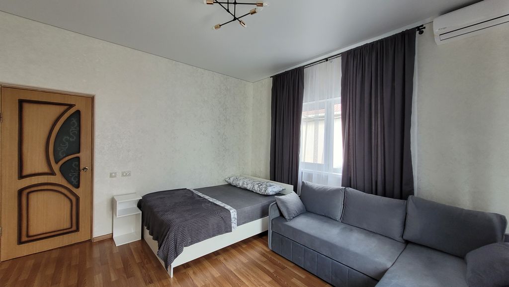 Четырёхместный номер Уютный номер в гостевом дворе на Пролетарской