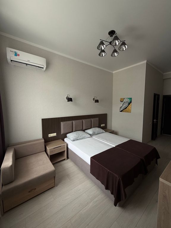 Трёхместный номер Делюкс