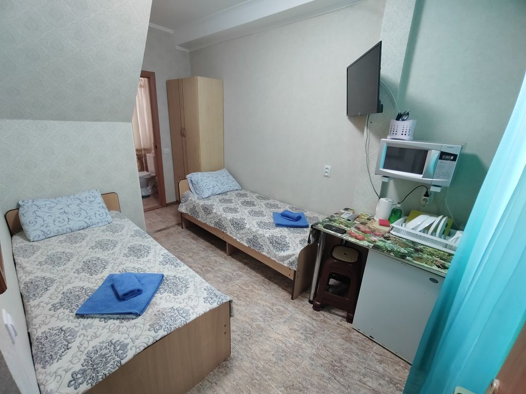 Двухместный номер с 2 отдельными кроватями стандарт