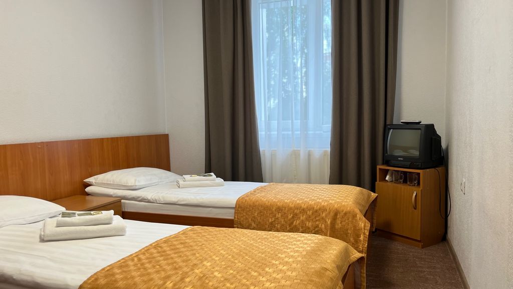 Двухместный номер с 2 отдельными кроватями эконом двухместный