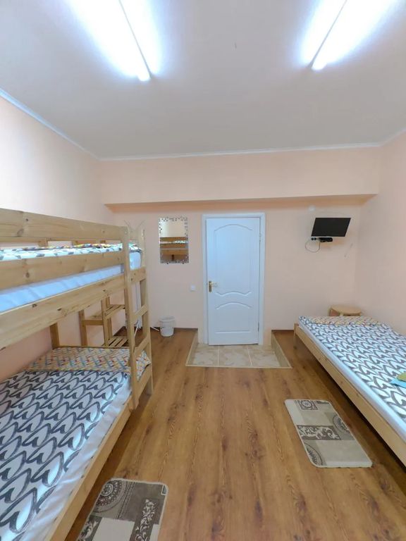 Трёхместный номер с общей ванной комнатой