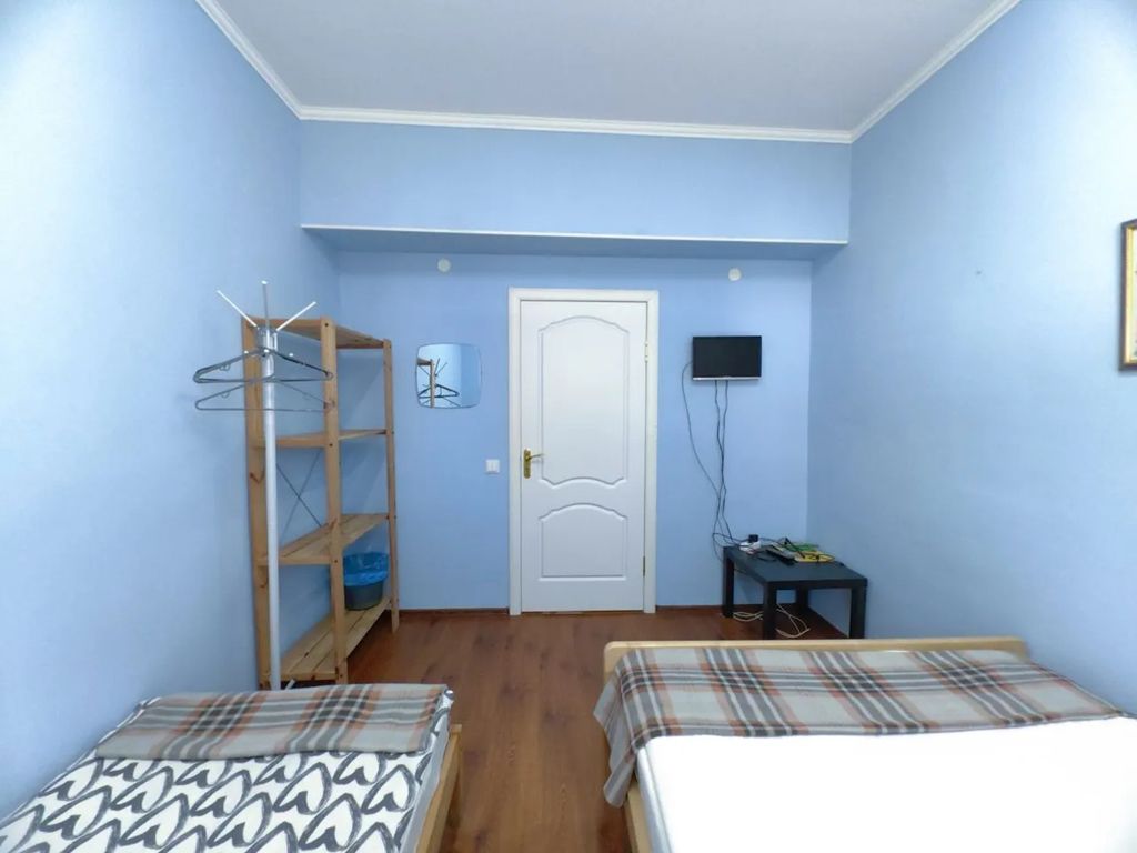 Трёхместный номер с общей ванной комнатой