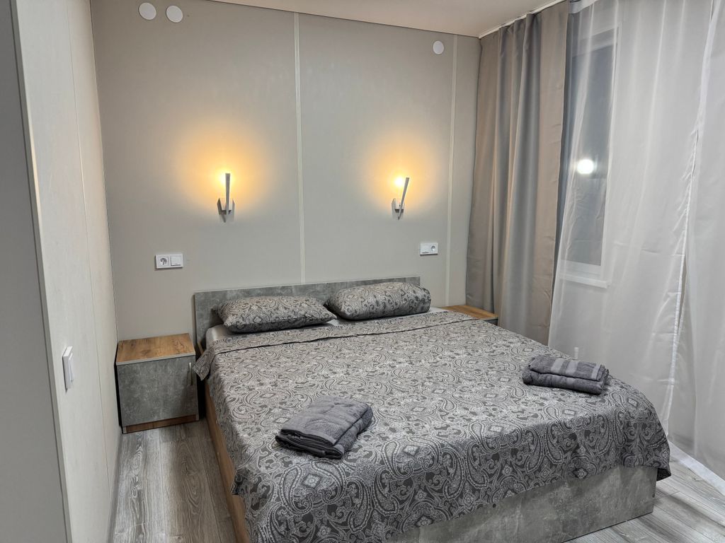 Комната спальня с гостинной