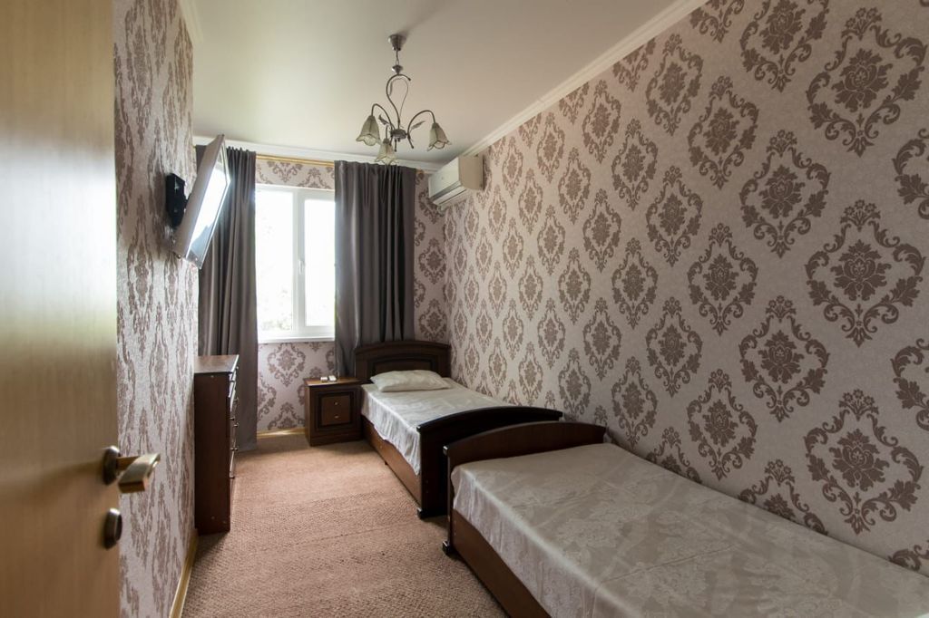 Двухместный номер с 2 отдельными кроватями стандарт