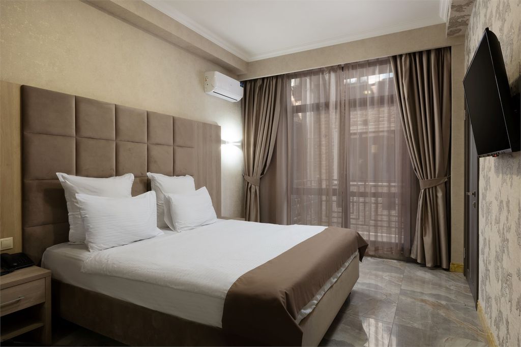 Двухместный номер с 1 кроватью или двумя односпальными ĸроватями и балĸоном стандартный