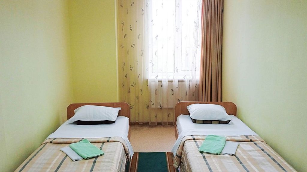 Двухместный номер с 2 отдельными кроватями эконом