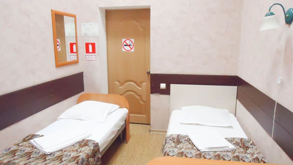 Двухместный номер с 2 отдельными кроватями эконом