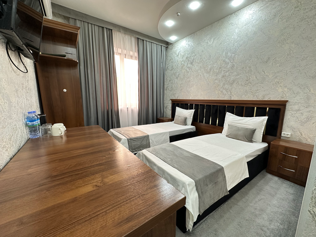 Двухместный номер с 2 отдельными кроватями стандарт