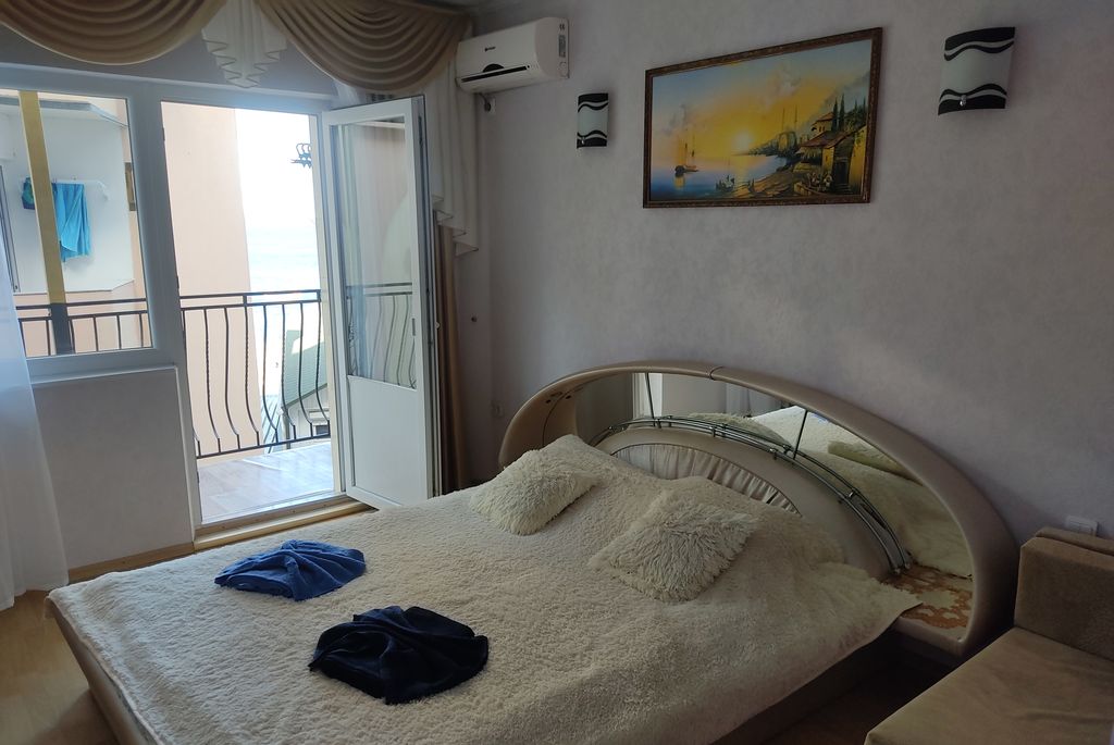 Трёхместный номер Однокомнатный номер с кухней и балконом