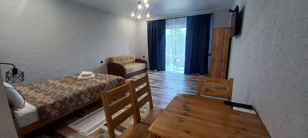 Четырёхместный номер Просторная студия с кухней