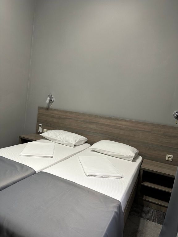 Двухместный номер с 2 отдельными кроватями стандарт улучшенный