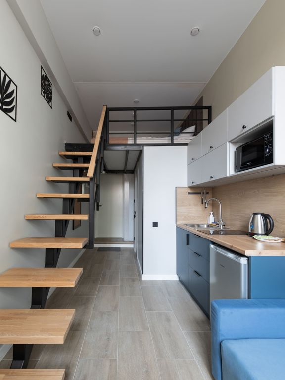 Четырёхместный номер двухуровневая студия