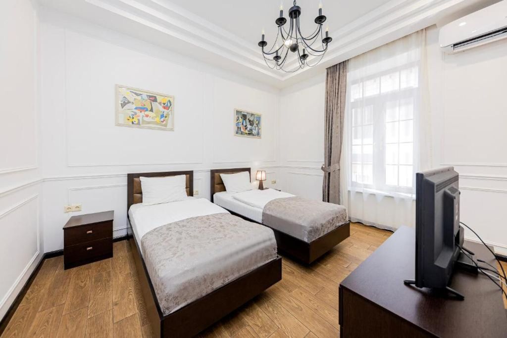 Двухместный номер с 2 отдельными кроватями делюкс