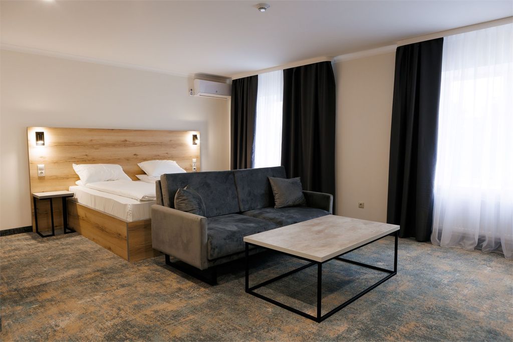 Трёхместный номер Делюкс