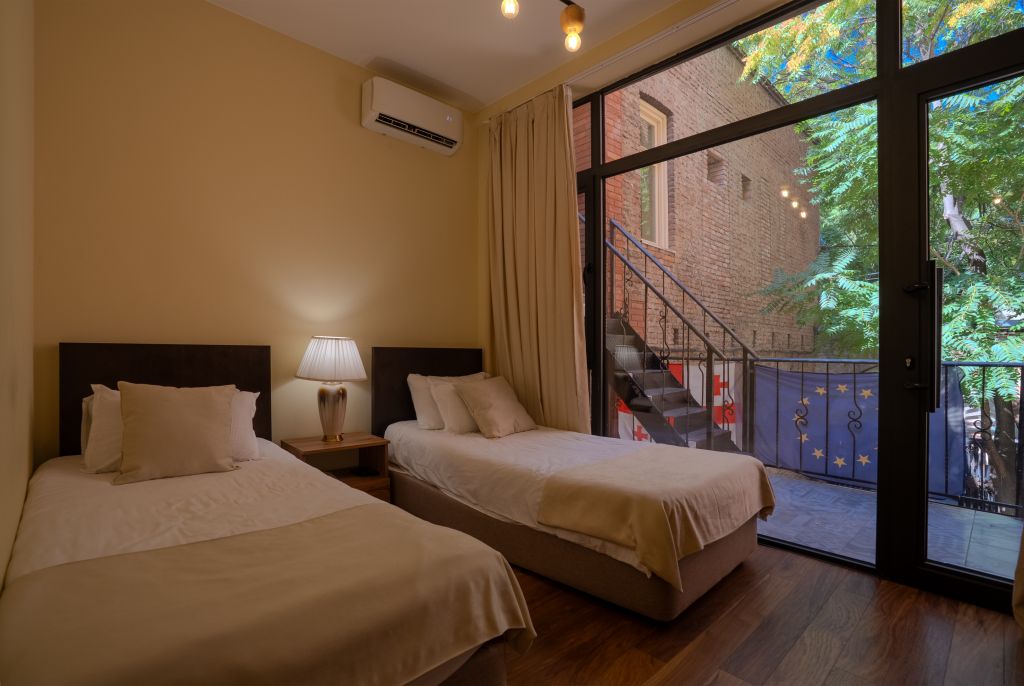 Двухместный номер с 2 отдельными кроватями или с 1 двуспальной