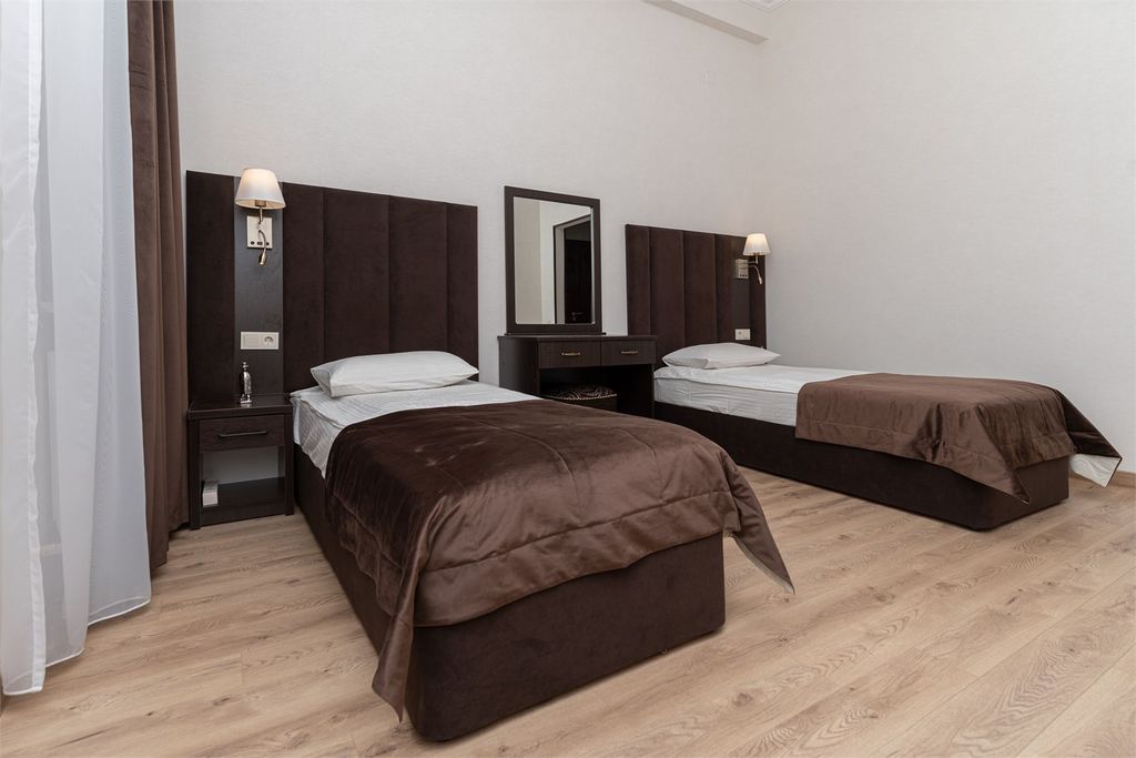 Двухместный номер с 2 отдельными кроватями стандарт