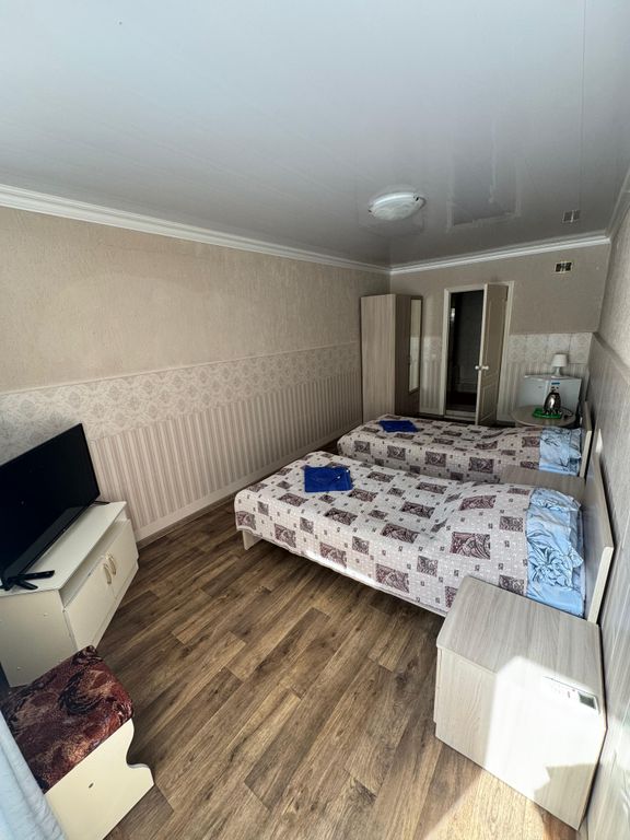 Двухместный номер с 2 отдельными кроватями на первом этаже с отдельным входом