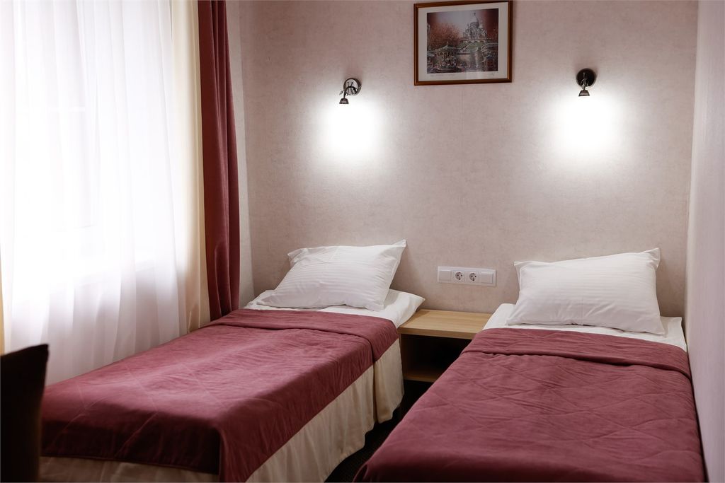 Двухместный номер с 2 отдельными кроватями стандарт