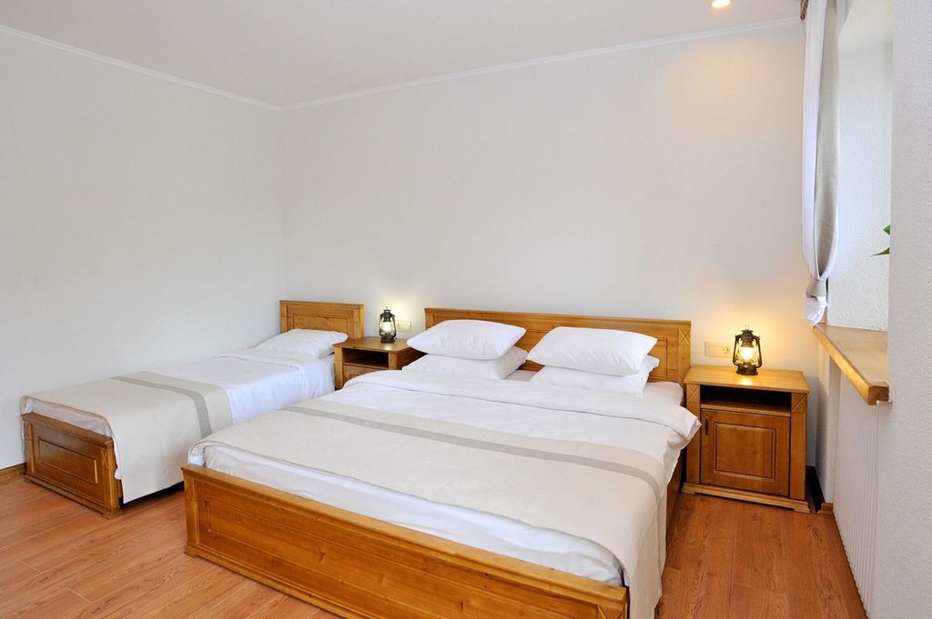 Трёхместный номер полулюкс