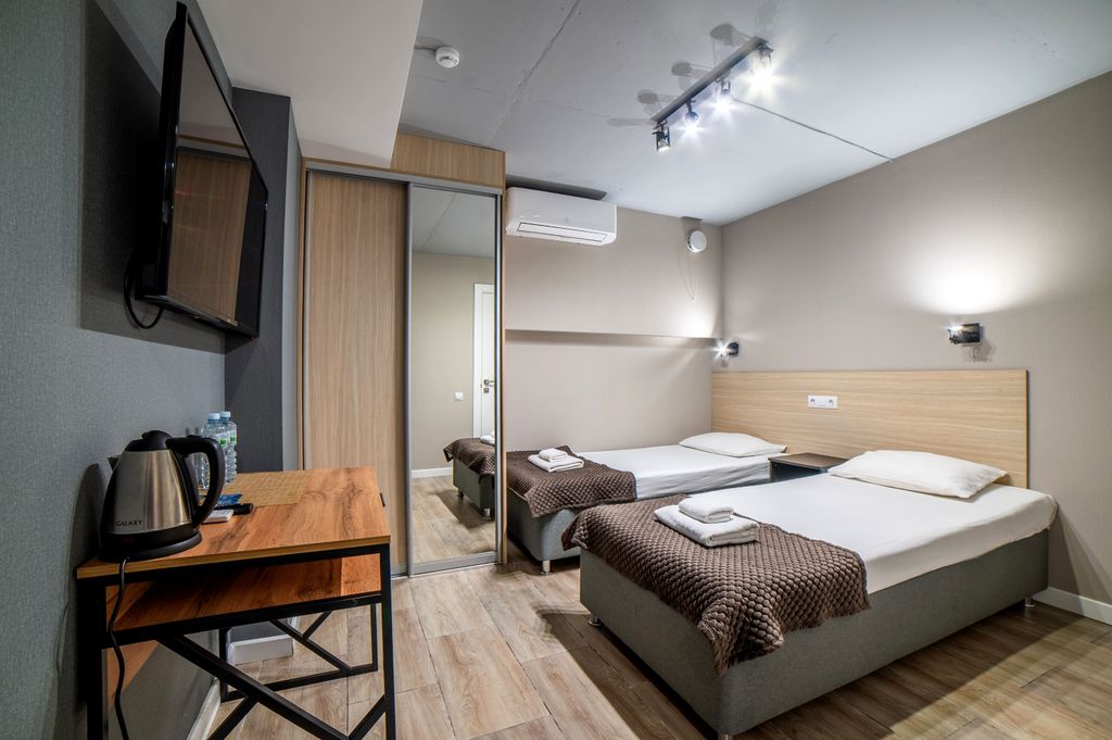 Двухместный номер с 2 отдельными кроватями Капсульный без окна