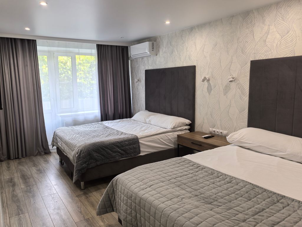 Четырёхместный номер делюкс