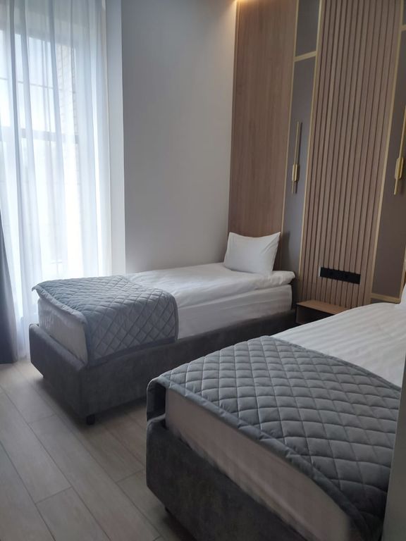 Двухместный номер с 2 отдельными кроватями улучшенный